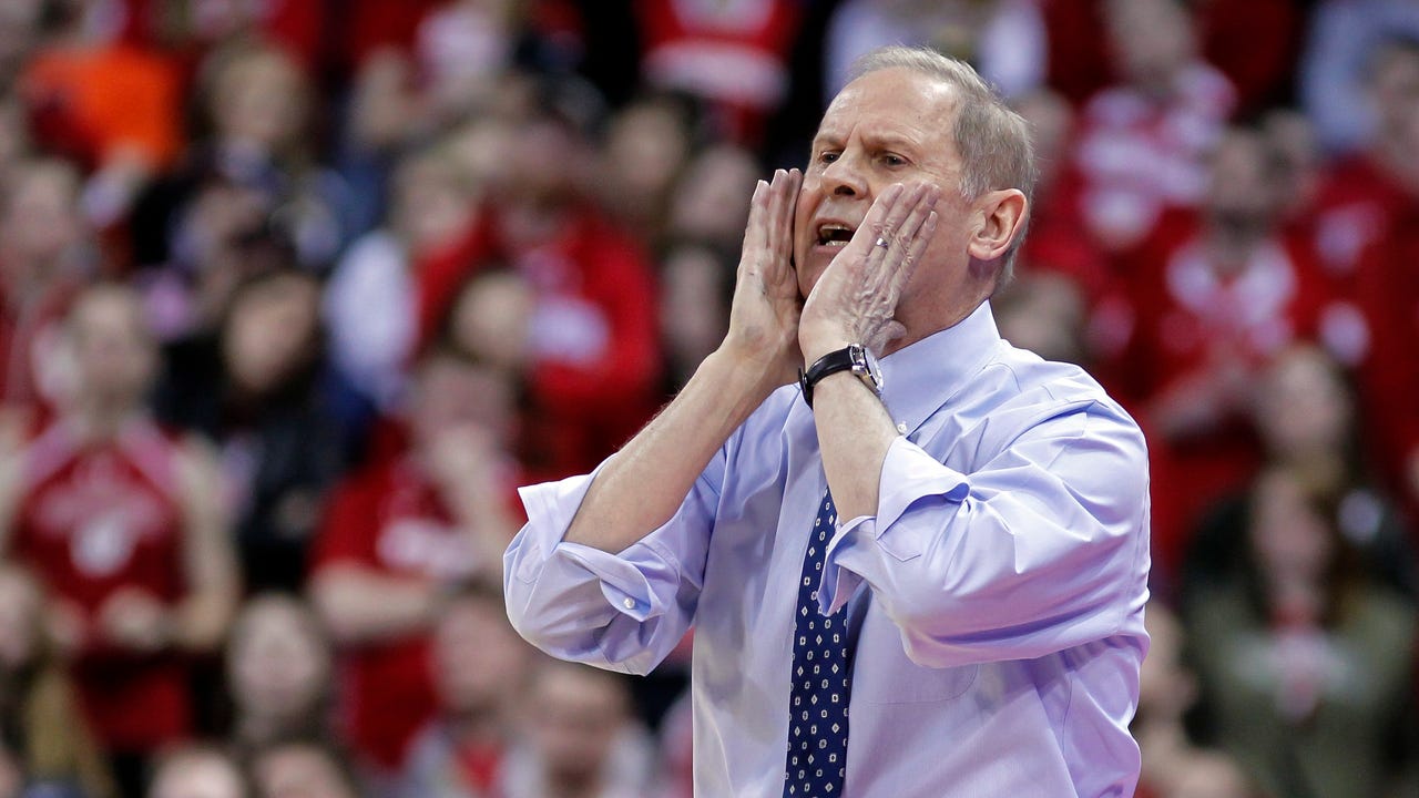 Louisville Beats Michigan, 82-76, to Win National Championship