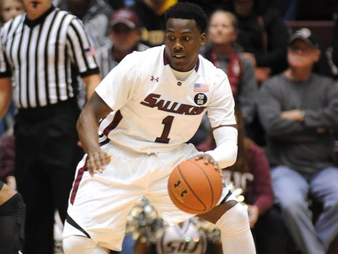 Southern Illinois' Jalen Pendleton (1) dribbles during the first period of a Missouri Valley Conference game at the SIU Arena in Carbondale, Ill.