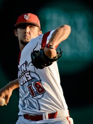 UL pitcher Evan Guillory hurls a pitch during the Ragin’