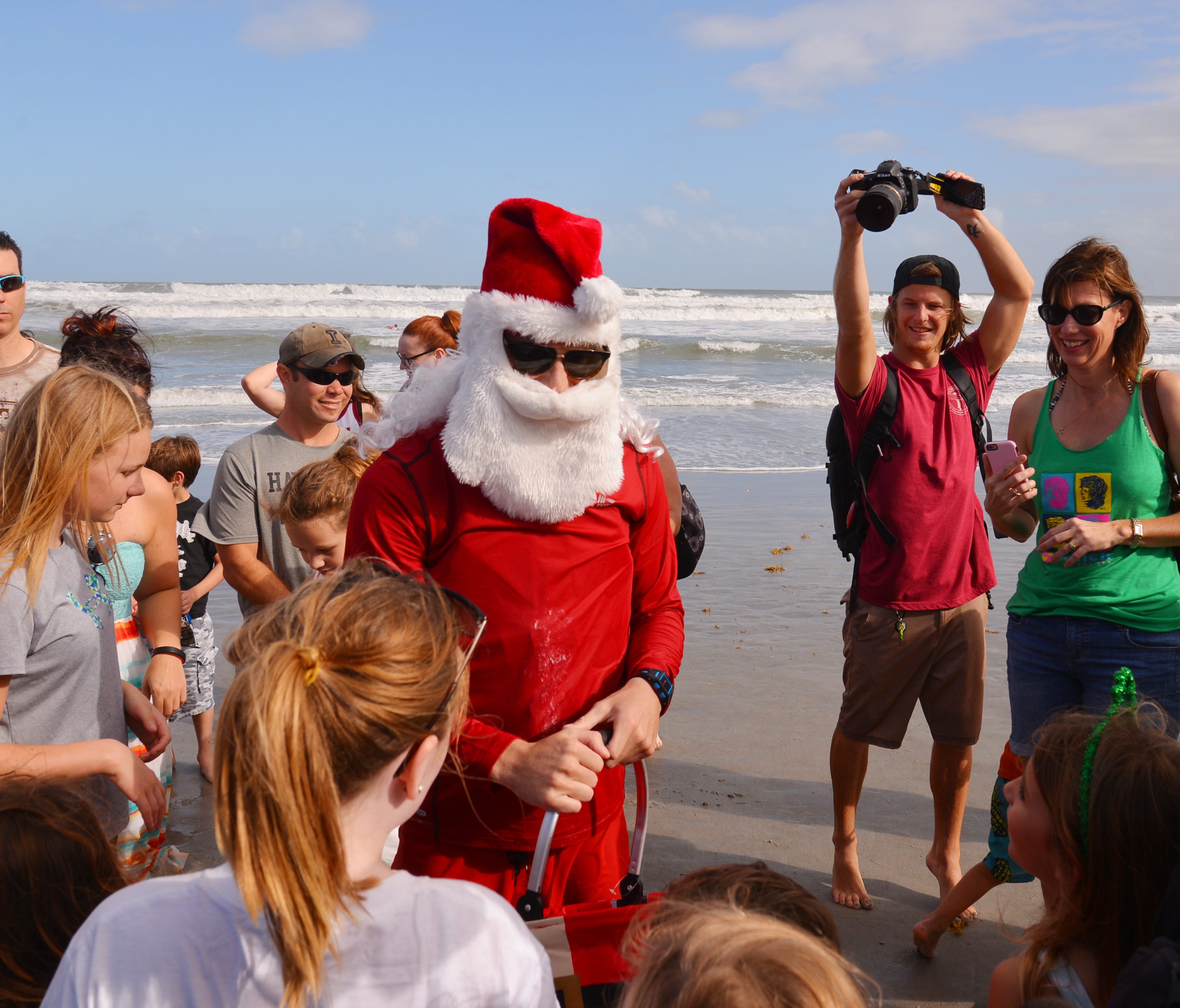 Surfing Santa spotted shredding waves in Cocoa Beach