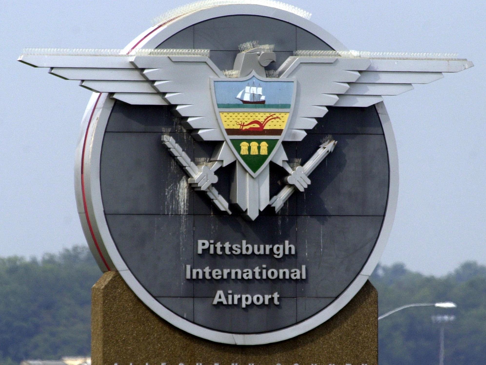 A sign for Pittsburgh International Airport is seen near an entrance to the airport on July 29, 2004.