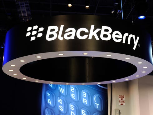 Signs appear at the Blackberry booth at the 2012 International Consumer Electronics Show in Las Vegas.