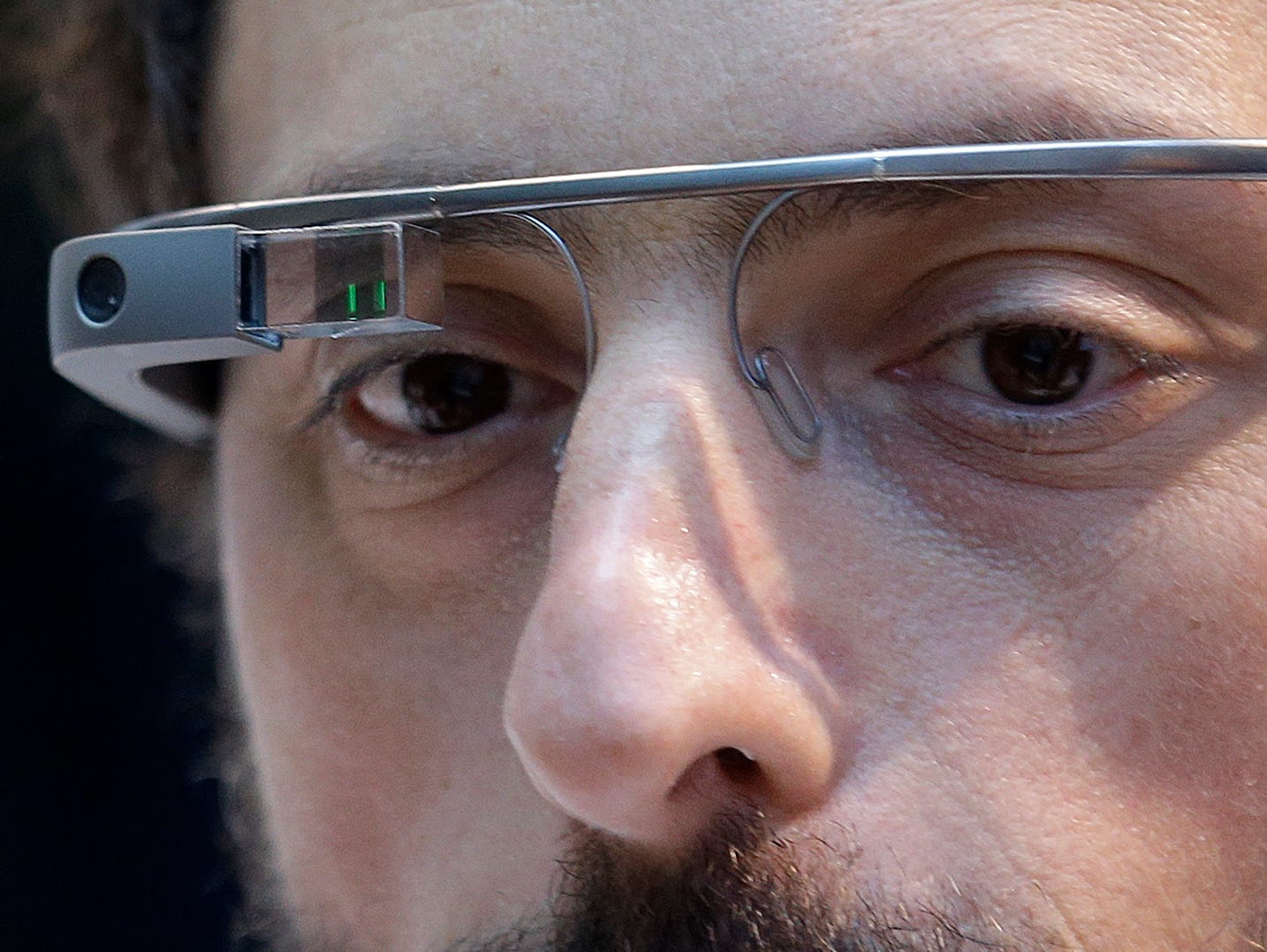 Google co-founder Sergey Brin wears a Google Glass device in San Francisco on Nov. 18, 2013.