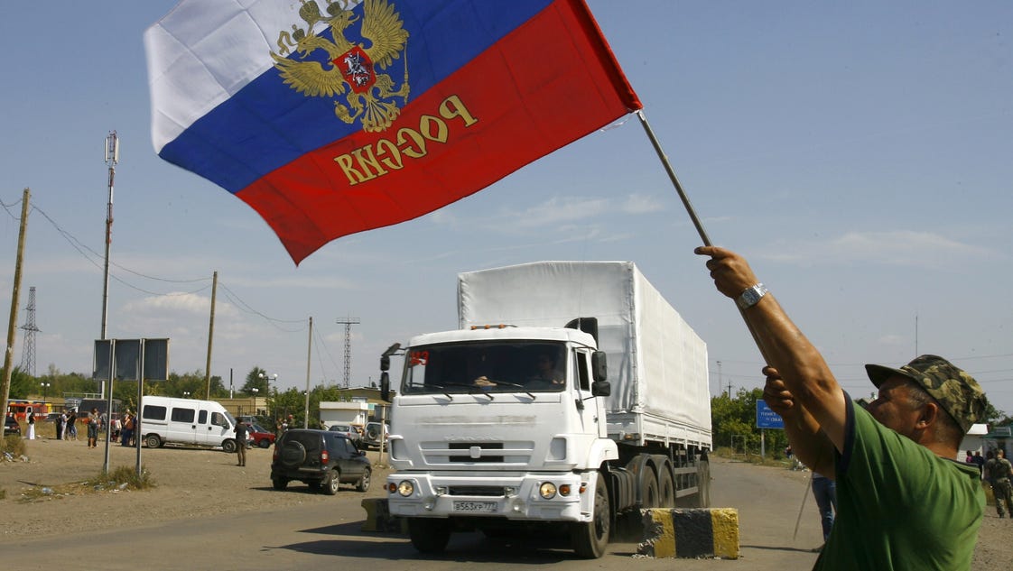 Russian Convoy Arrives In Ukraine Amid Shelling Reports