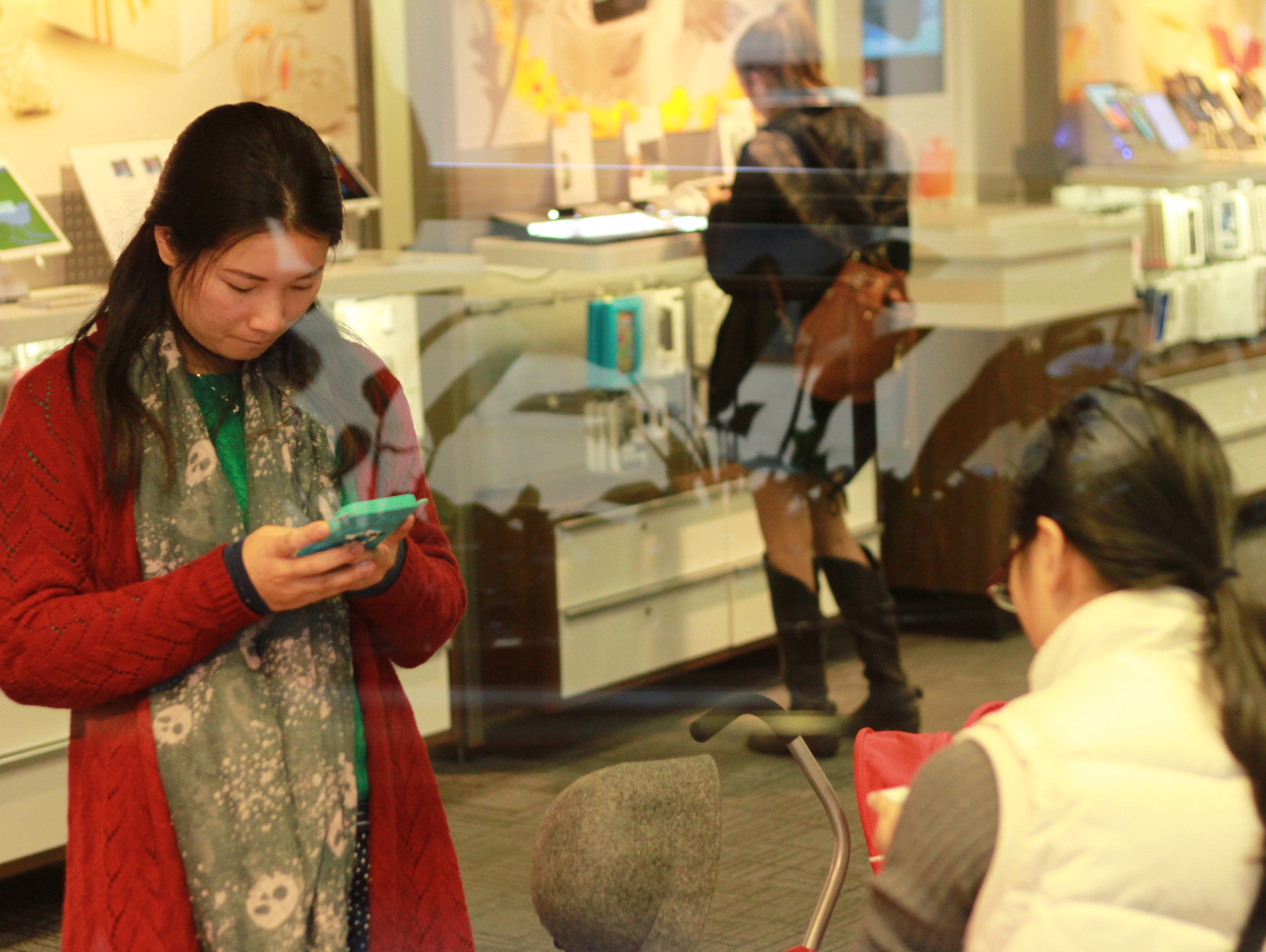 People are beginning there holiday shopping, but their information may not be as secure as they think. Shoppers at an Apple Store in San Francisco.