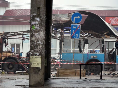 A destroyed trolley bus stands on a street in Volgograd, Russia, after a suicide bombing during rush hour Dec. 30. At least 14 people were killed.