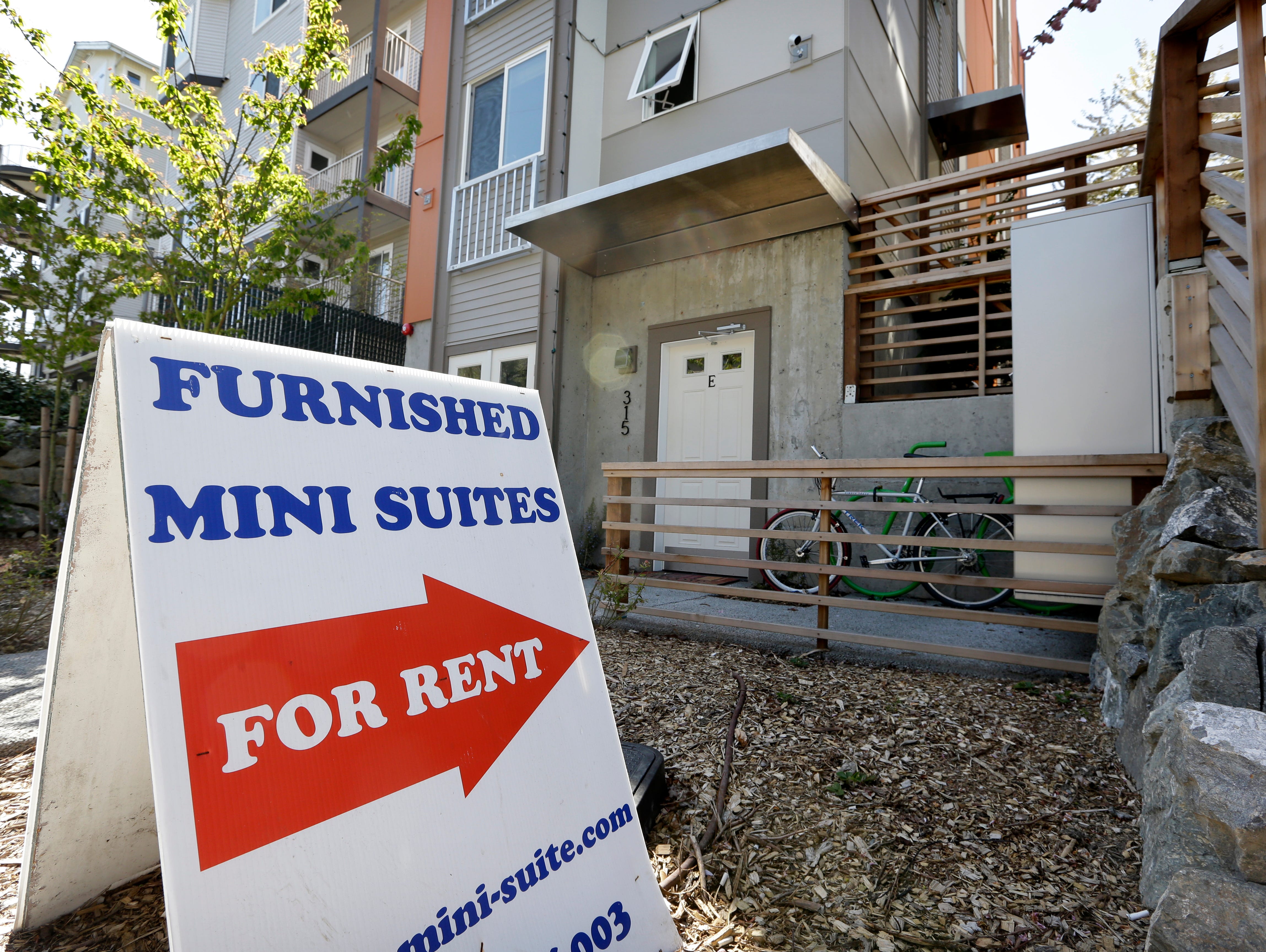 A new building holding tiny apartments, in Seattle opens in 2013. The size of the apartments in some of these new buildings are roughly the size of large parking spot. Cities such as San Francisco, New York and Boston have been encouraging tiny apart