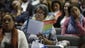 Participants in an Ebola education session look over