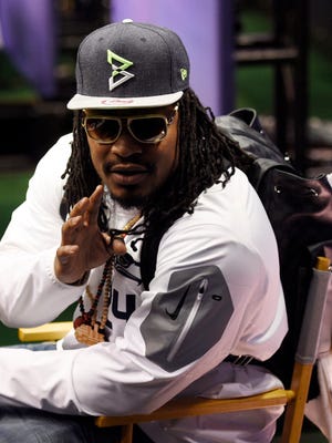 Marshawn Lynch selling I'm just here so I won't get fined shirts - Sports  Illustrated