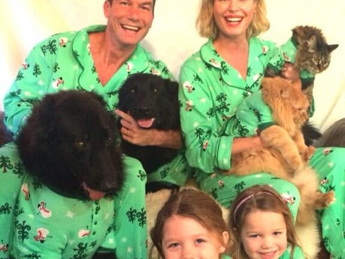 Actress Rebecca Romijn posted a photo on Twitter of her family getting ready for the holidays.