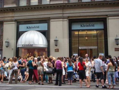 Brides and their friends line up outside Kleinfeld, New York, for one of the wedding gown store''s sample sales.