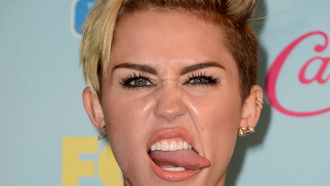 What Is Up With Miley Cyrus Tongue 