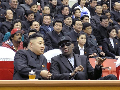 In photo taken February 28, 2013 and released by North Korea's official Korean Central News Agency, North Korean leader Kim Jong-Un (left) and former NBA star Dennis Rodman speak at a basketball game in Pyongyang. Rodman has become the most high-prof