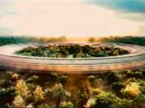 This undated rendering provided by Apple shows a proposed 150-acre campus built around a gigantic circular building made almost entirely of curved glass, with a heavily landscaped center.