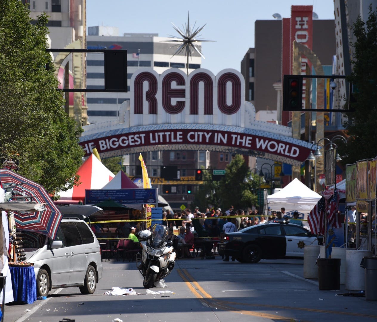 Minivan crashes into Reno Wing Fest booth, driver shot dead