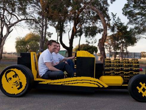 Entrepreneur Steve Sammartino, left, and Raul Oaida take their Lego car on a test drive.