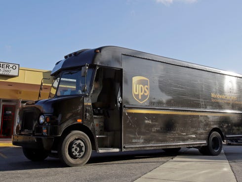 A UPS truck arrives for a delivery in Miami Springs, Fla., in January.