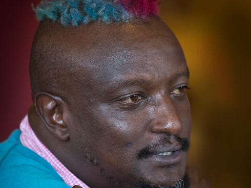 Prize-winning Kenyan author Binyavanga Wainaina talks during a television interview in Nairobi, Kenya, on Jan. 22.