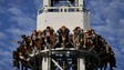 North Koreans scream on the free-fall ride.