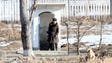 A North Korean soldier looks across the border with