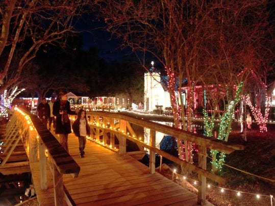 Lights, music and displays create festive feel in Acadian Village