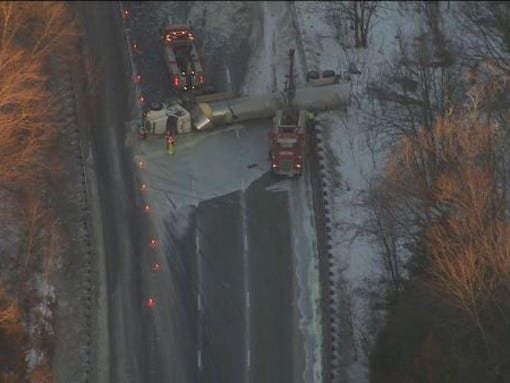 Overturned tractor-trailer near I-80 in Hope Township.~