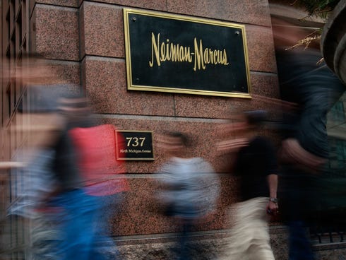 Pedestrians walk past a Neiman Marcus store  Mar 5, 2009 in Chicago.