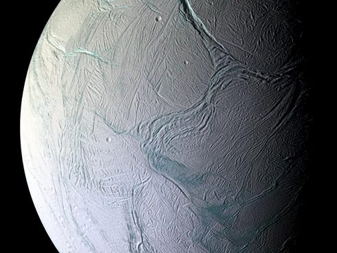 A view of Enceladus, one of Saturn's moons.