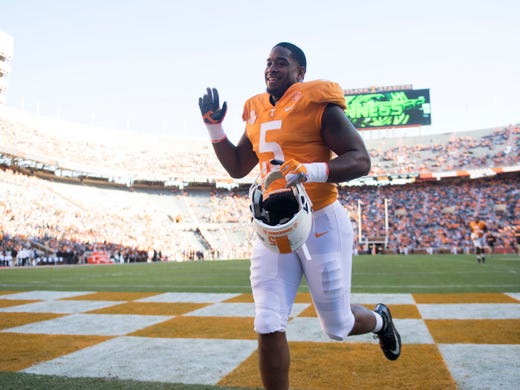 tennessee defensive lineman kyle phillips (5) waves to the crowd