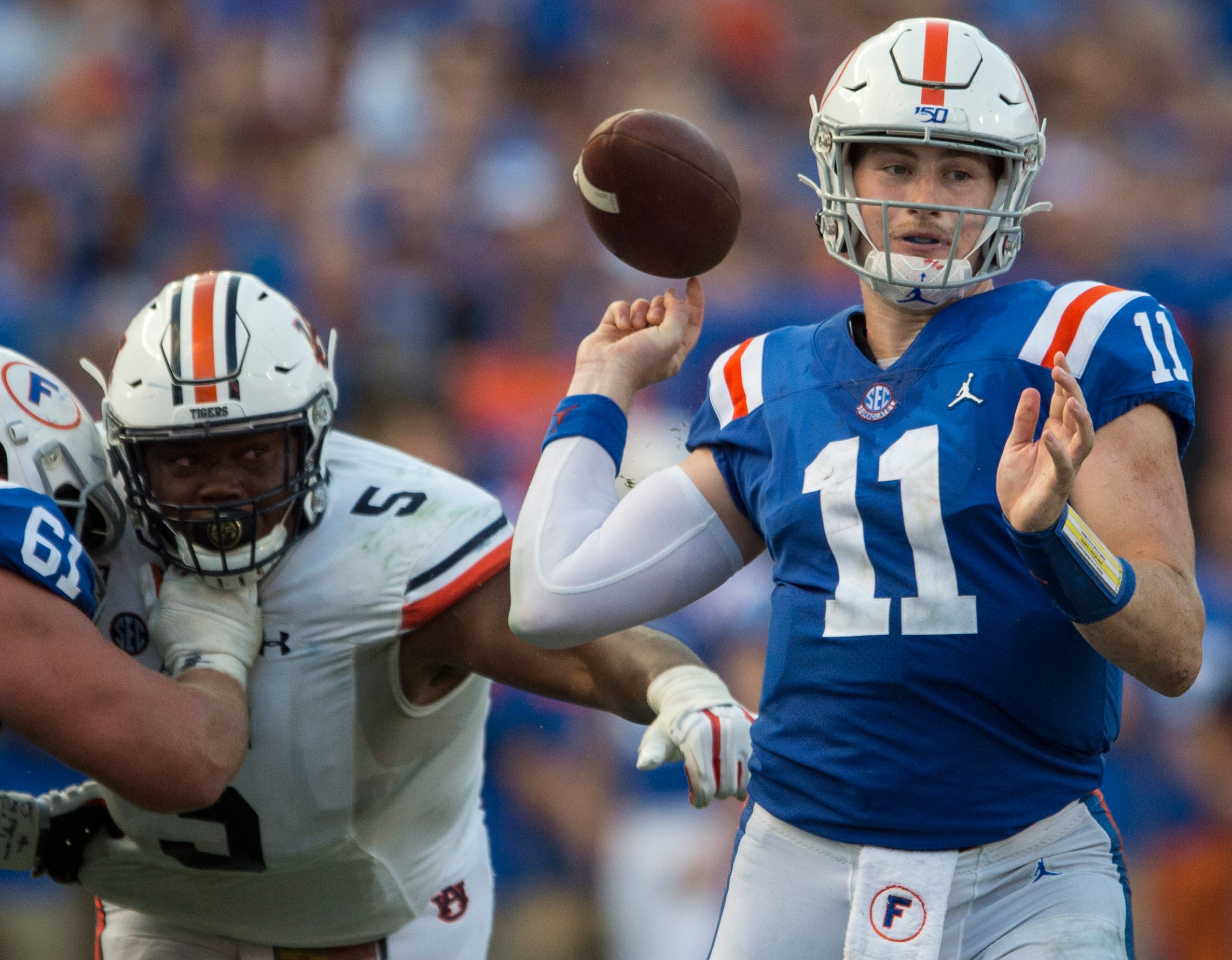 auburn defensive lineman derrick brown (5) knocks the ball out