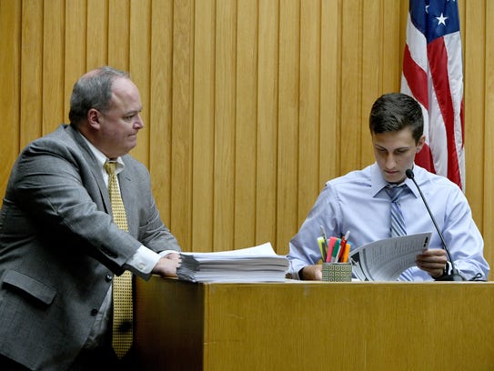 Noah Walton on the stand with Assistant District Attorney