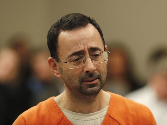 Larry Nassar, 54, appeared in court for a plea hearing in Lansing, Mich., on Nov. 22, 2017. Nasser, a former sports doctor, pleaded guilty to multiple charges of sexual assault.