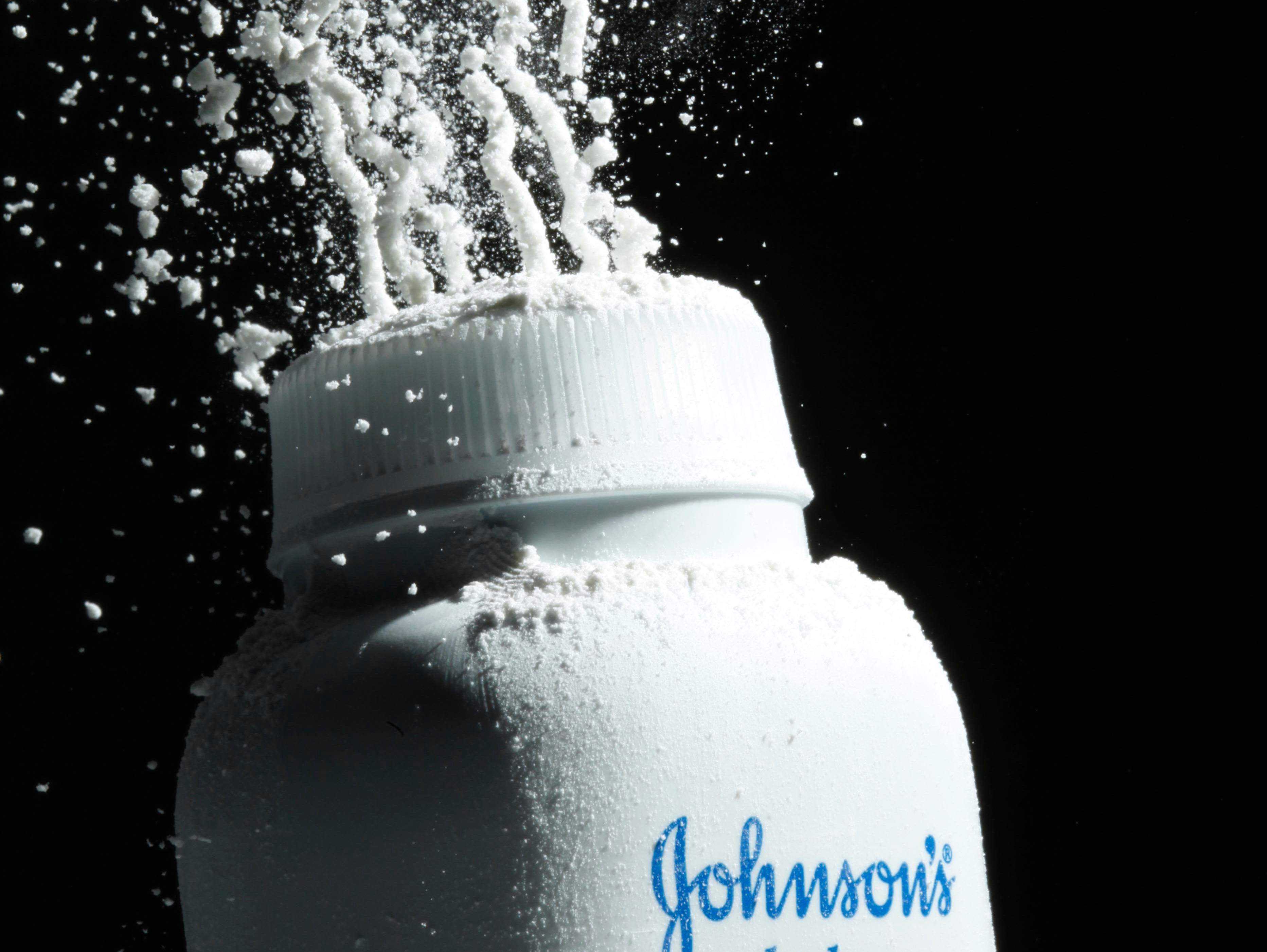 Johnson's baby powder is squeezed from its container. On Monday, Aug. 21, 2017, a Los Angeles County Superior Court spokeswoman confirmed that a jury has ordered Johnson & Johnson to pay $417 million in a case to a woman who claimed in a lawsuit that