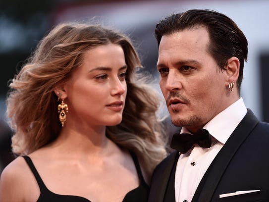Judge grants Amber Heard restraining order against Johnny Depp