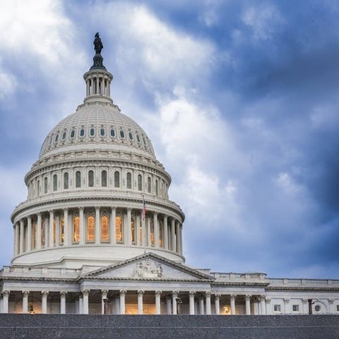 The dome of the U.S. Capitol Building in front of 