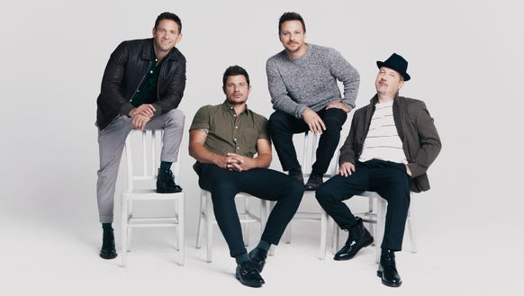 The boy band 98 Degrees is performing at the Grand