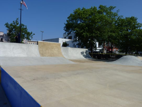 Flipping and grinding at the Plainfield skate park grand opening