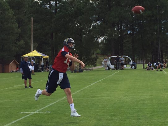 Case Cookus throws a pass during Northern Arizona's