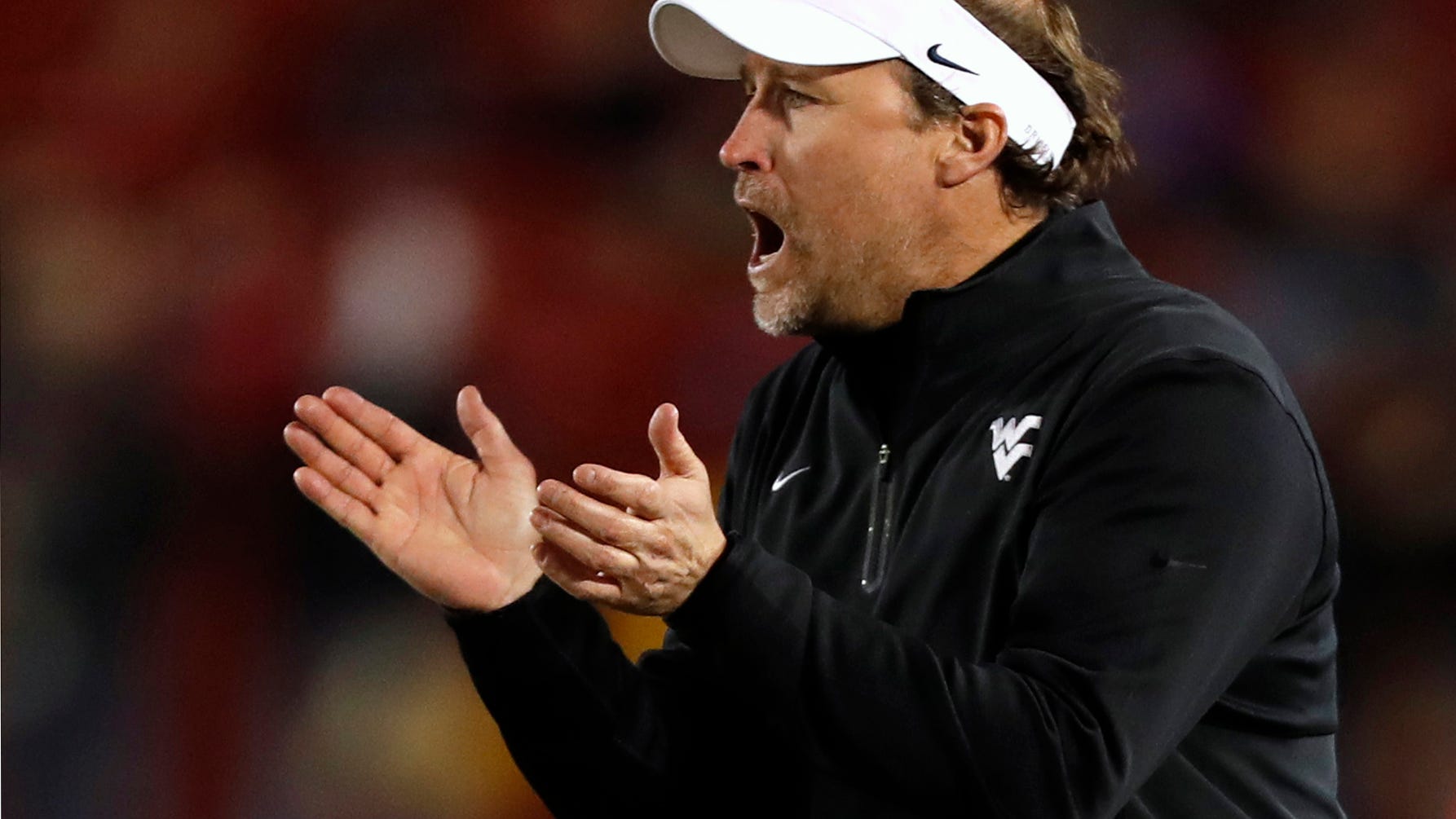 West Virginia Coach Holgorsen Gets 5 Year Contract Extension