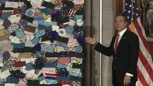 Gov Andrew Cuomo Shows A Mural Of Donated Masks To New York