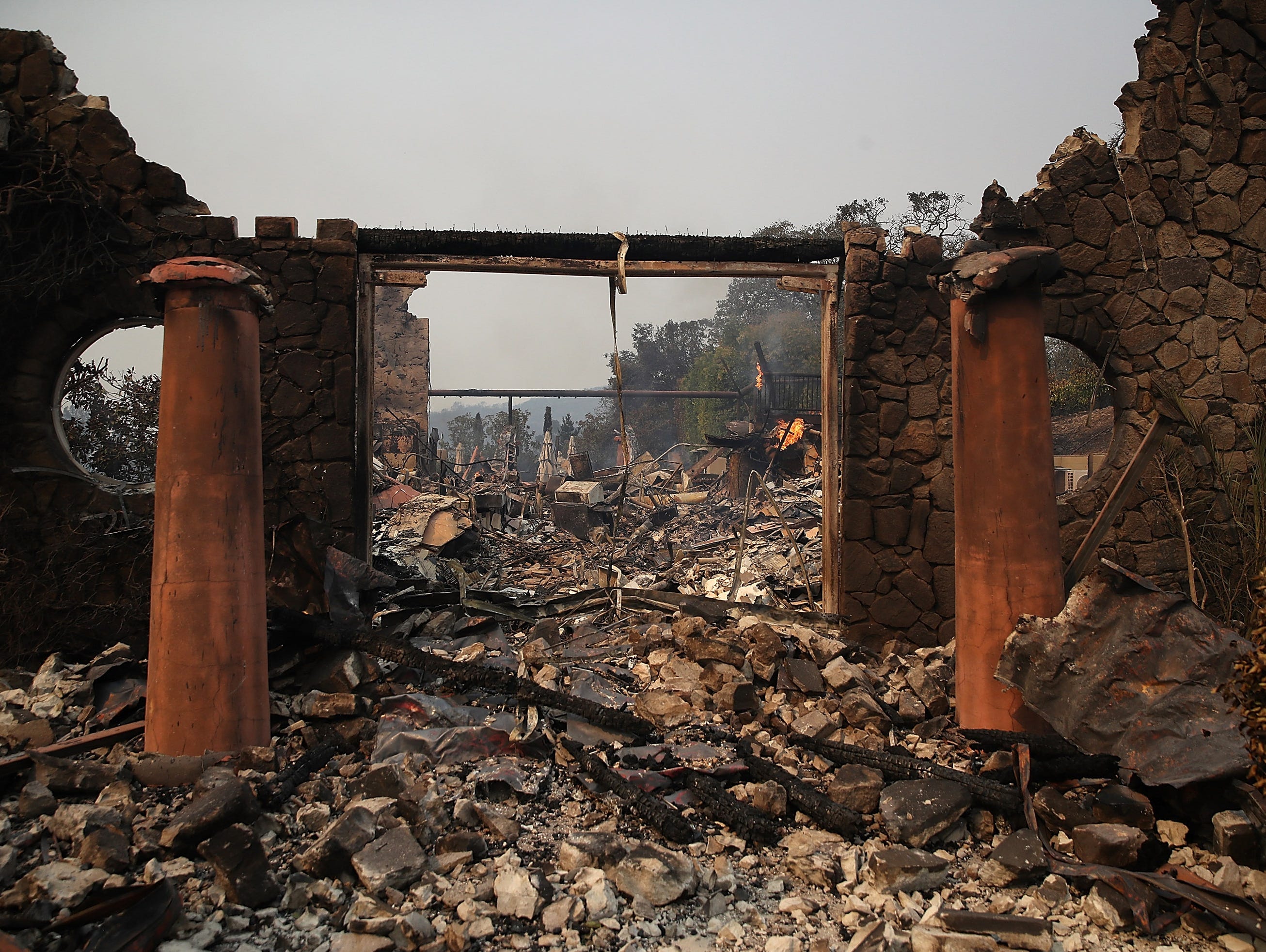 The remains of the fire-damaged Signarello Estate winery after an out of control wildfire moved through the area on Oct. 9, 2017 in Napa, Calif.