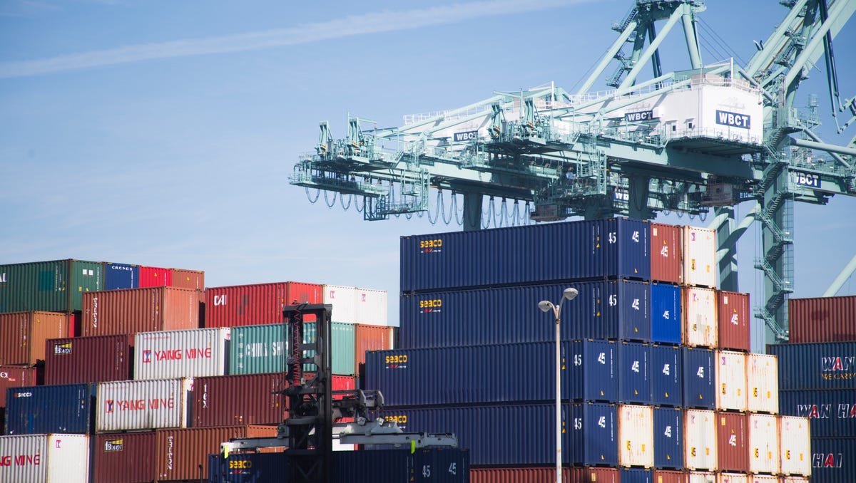 Containers are stacked and stored after being unloaded from ships in the Port of Long Beach.