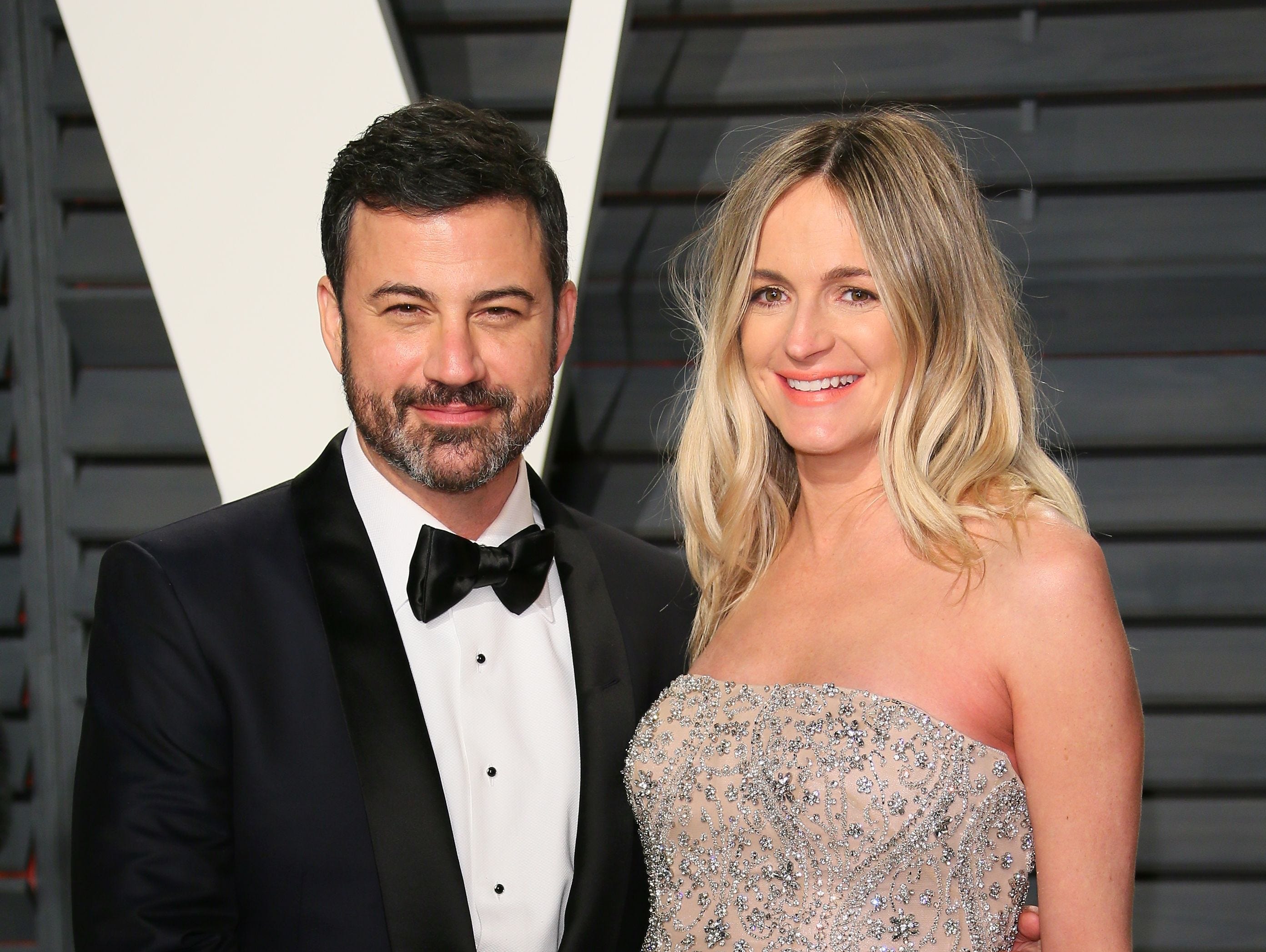 Jimmy Kimmel, left, and his wife, Molly McNearney, arrive at a post-Oscars party in February. Their newborn son underwent successful open-heart surgery last week.