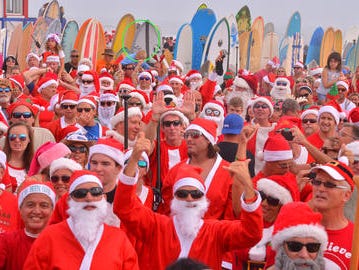 Surfing Santas Event Draws Tourists, Takes On Australia