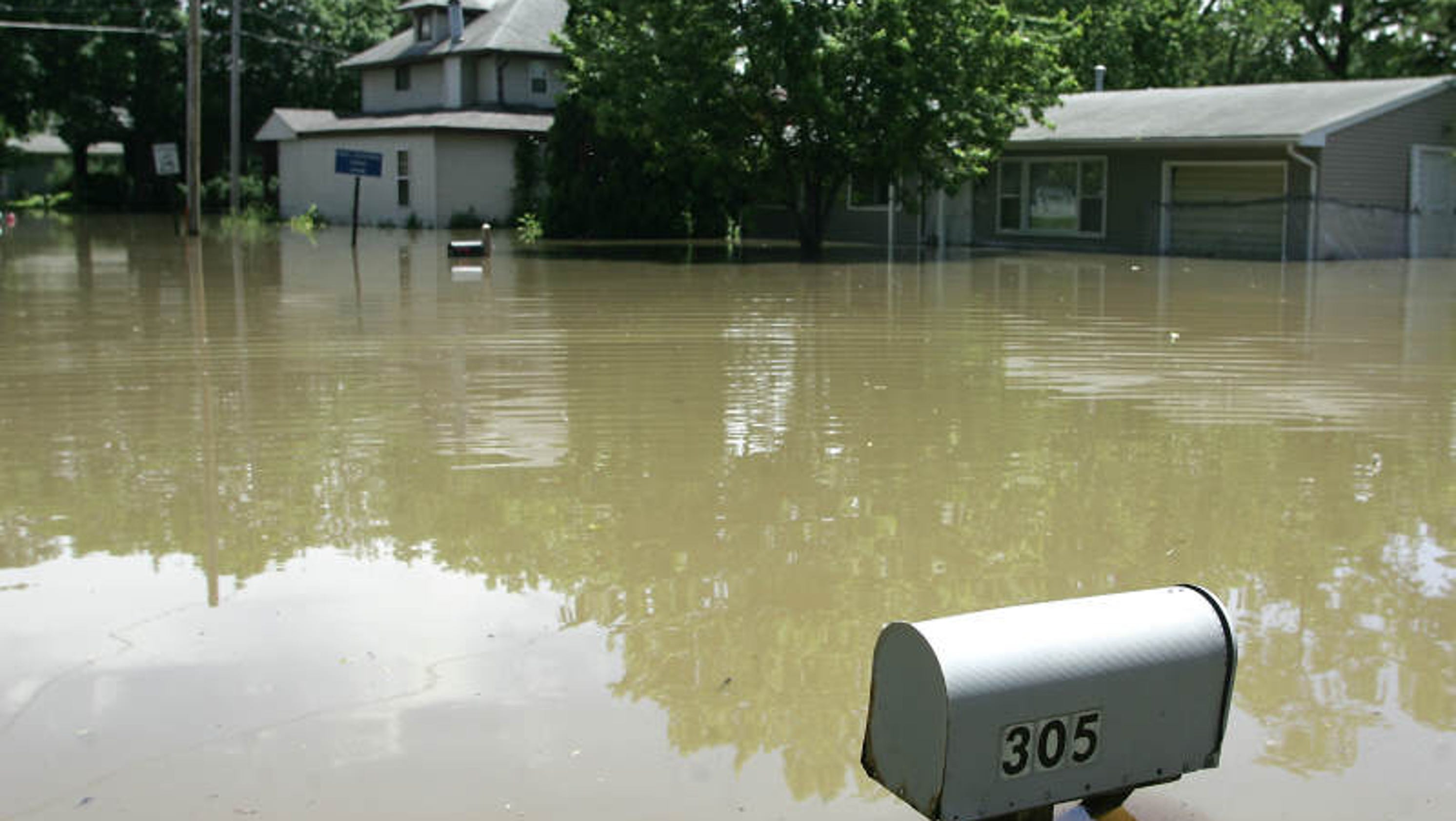 2008 Iowa City river flood effects growth, policies years later