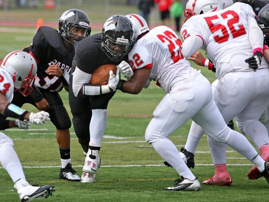 Shuler, Defense Lead Woodbridge Football Past Perth Amboy