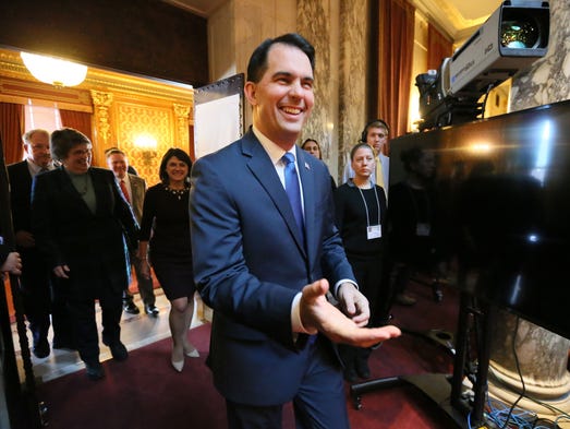 wi 2018 tax credit child $122 million Walker Scott call child to Wisconsin Gov. for