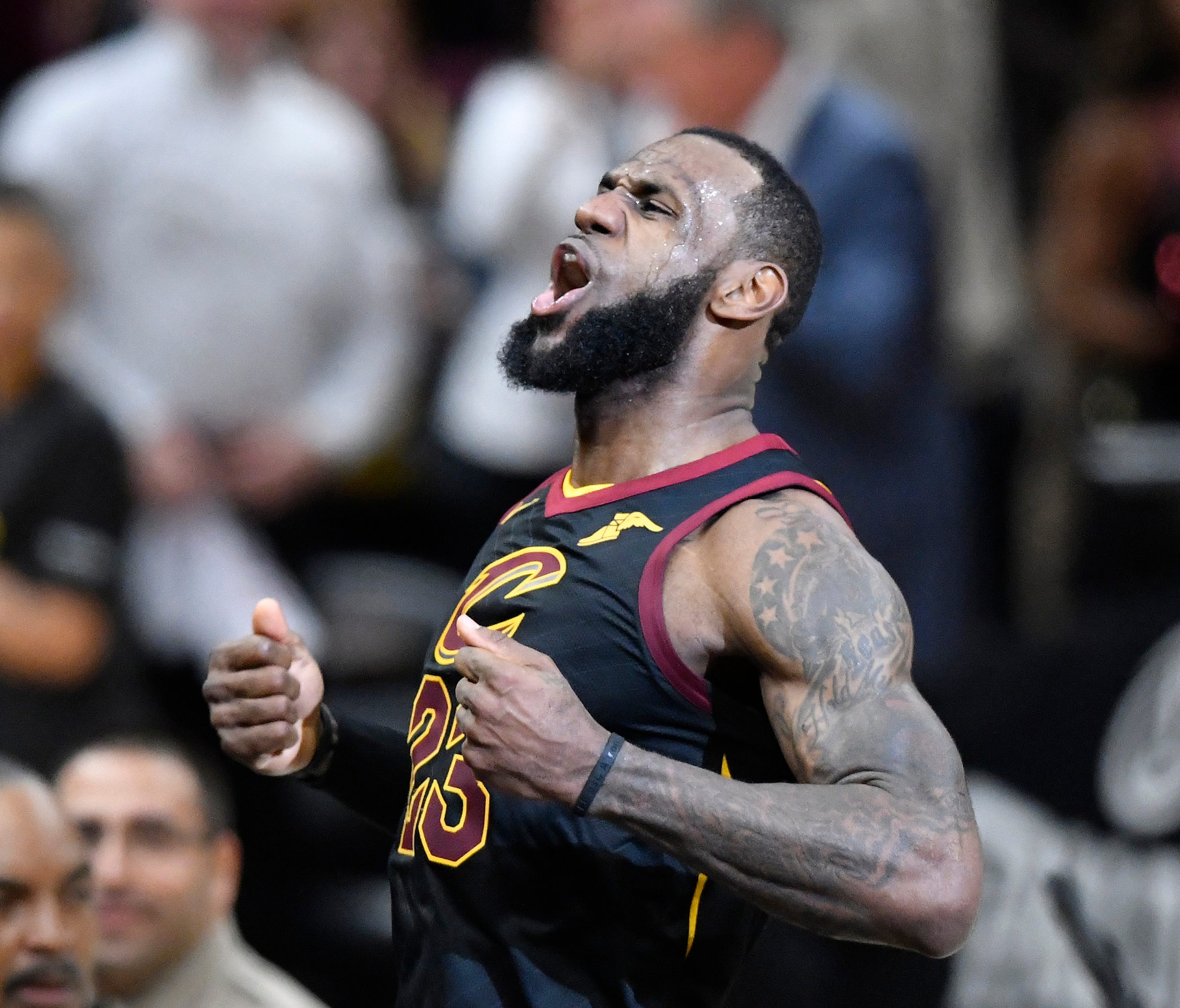 Cleveland Cavaliers forward LeBron James celebrates his game-winning three-point basket in the fourth quarter against the Indiana Pacers.