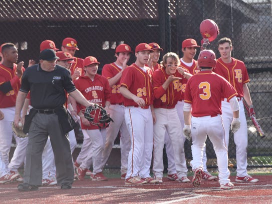 Bergen Catholic team celebrate as #3 LaManna reaches