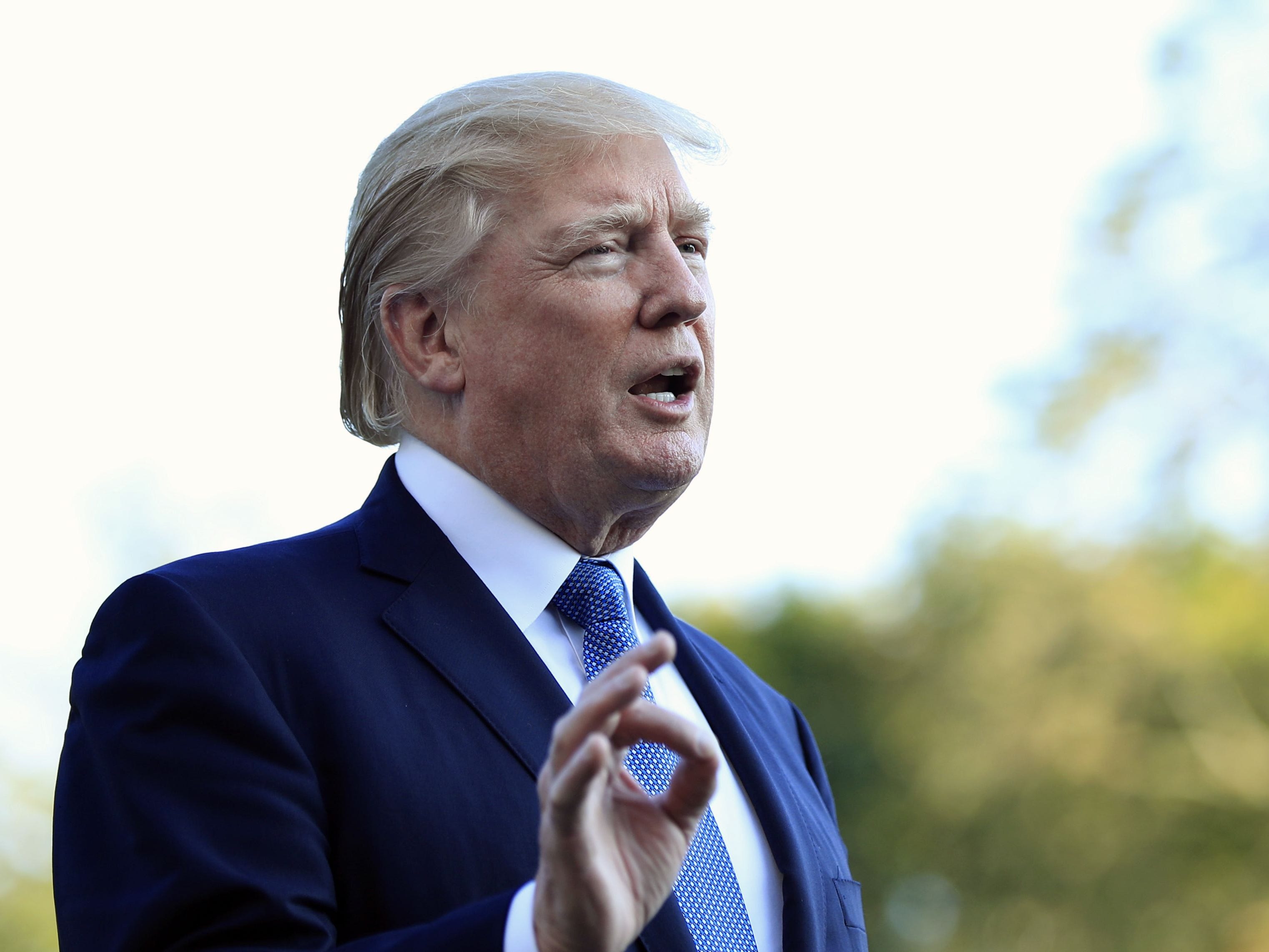 President Donald Trump speaks to reporters upon his return to the White House in Washington, Sunday, Sept. 24, 2017. (AP Photo/Manuel Balce Ceneta)